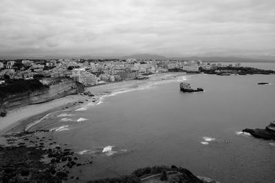 High angle view of beach against cloudy sky