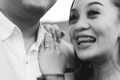 Close-up portrait of a smiling young woman