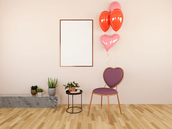 Empty chairs on table against wall at home