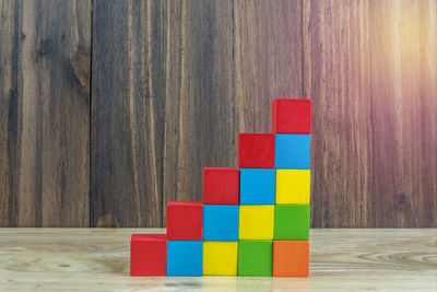 Close-up of multi colored toy on wooden table