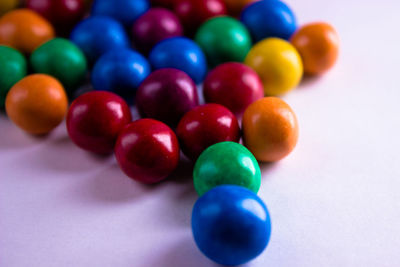 High angle view of multi colored balls on table