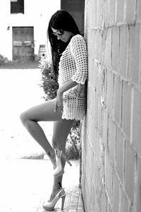 Side view of girl standing in park