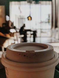 Close-up of coffee cup on table