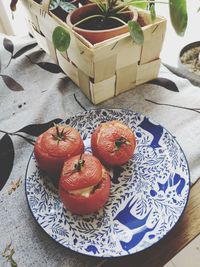 High angle view of fruits in basket on table