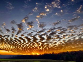 Scenic view of dramatic sky during sunset