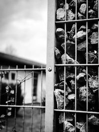 Close-up of metal structure against sky