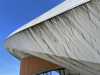 Low angle view of building against clear blue sky