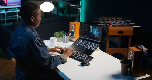 Midsection of man using calculator