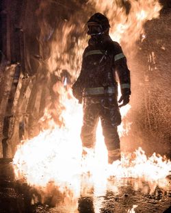 Silhouette of man with fire crackers