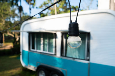 Close-up of electric light on street