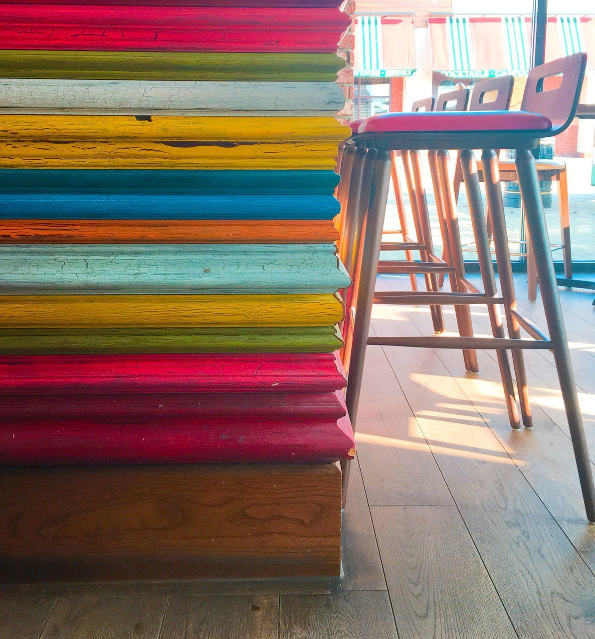 CLOSE-UP OF MULTI COLORED CHAIRS