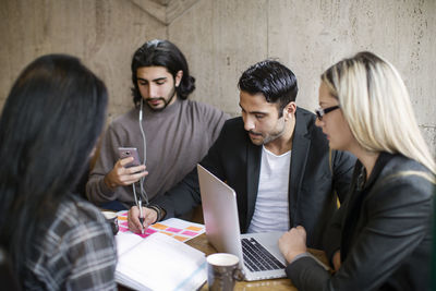 Young people in cafe