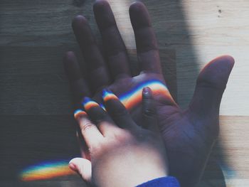 Close up of human hand on wall