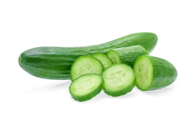 Close-up of green pepper against white background