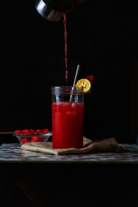 Glass of juice on table