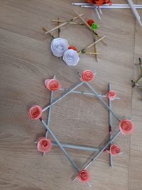 High angle view of red rose on table