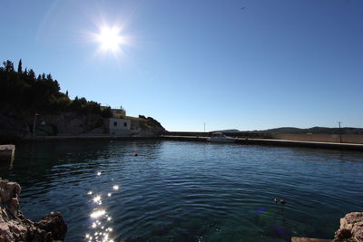 Sun shining over sea