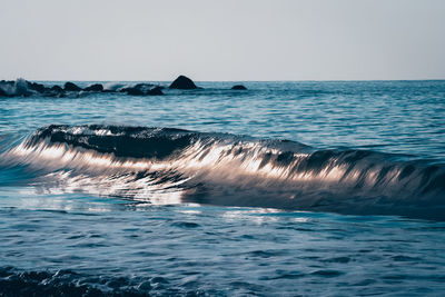 Scenic view of sea against clear sky