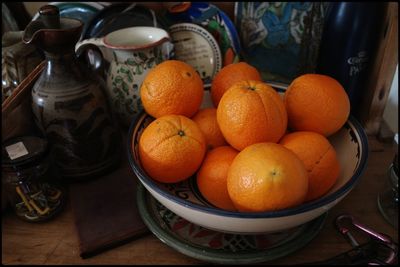 Close-up of oranges in container