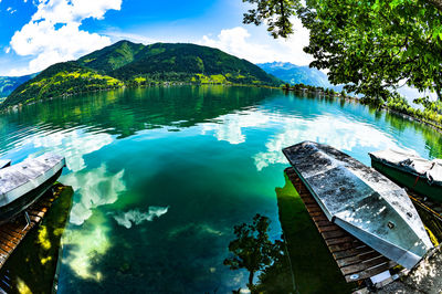 Aerial view of lake and mountains against sky