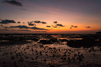 Scenic view of sea against sky at sunset