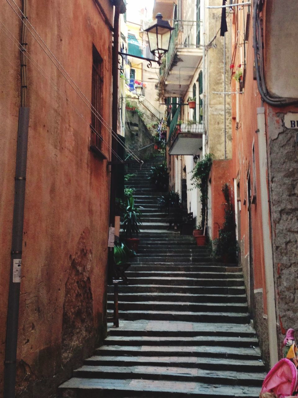 NARROW STREET AMIDST BUILDINGS