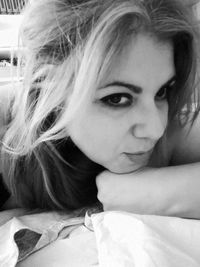 Close-up portrait of a smiling young woman