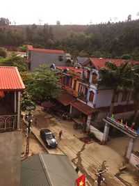 High angle view of buildings and street in city