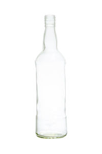 Close-up of glass bottle against white background
