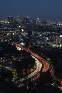 High angle view of illuminated city at night