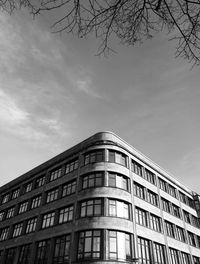 Low angle view of office building against sky