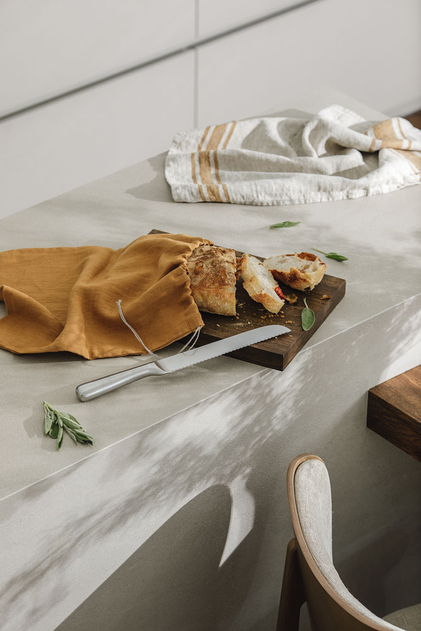 table, indoors, furniture, no people, food and drink, food, wood, textile, room, high angle view, still life, art