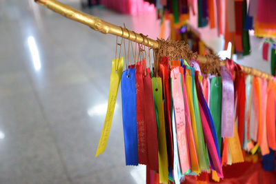 Close-up of multi colored clothes hanging