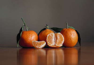 Close-up of orange fruits on table