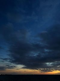 Scenic view of dramatic sky during sunset