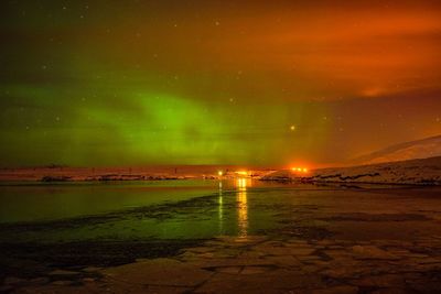 Scenic view of sea against sky at night