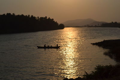 Scenic view of calm sea at sunset