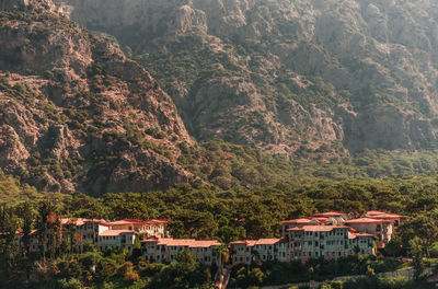High angle view of townscape by mountains