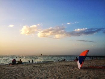 Scenic view of beach against sky during sunset