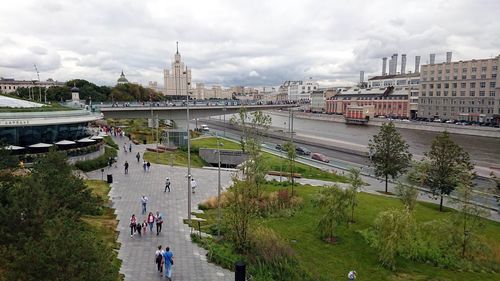 Bridge over river with buildings in background