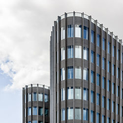 Low angle view of modern building against sky