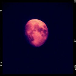 Low angle view of moon in sky