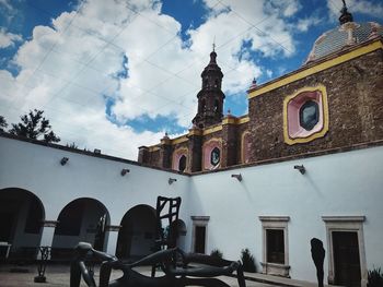 Low angle view of buildings against sky