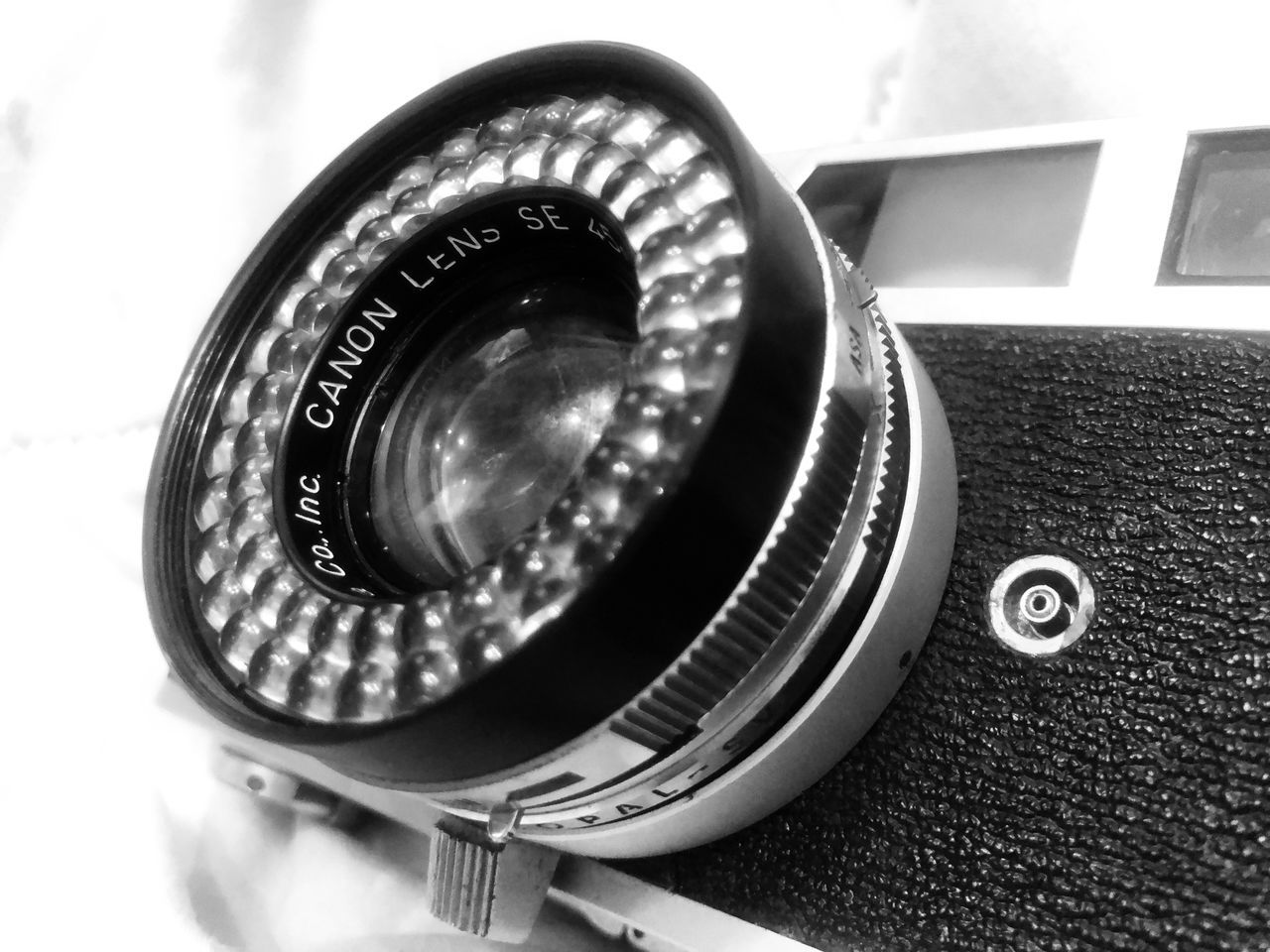 CLOSE-UP OF CAMERA ON LENS