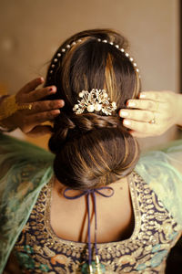 Rear view of woman wearing mask