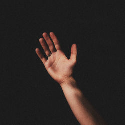 Hand in dark