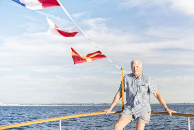 Confident senior man on a boat