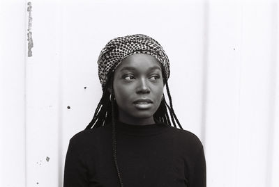 Close-up of young woman with dreadlocks