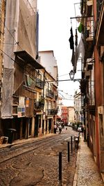 Street in city against clear sky