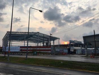 View of street light against cloudy sky